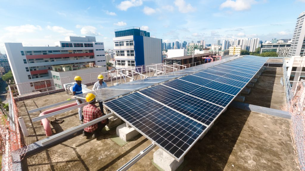 Installing solar panels at 71 Geylang