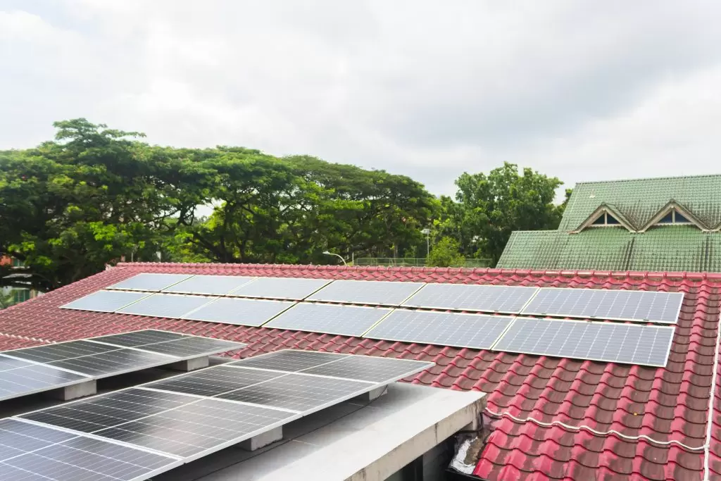 Solar panel and shade with daylighting.